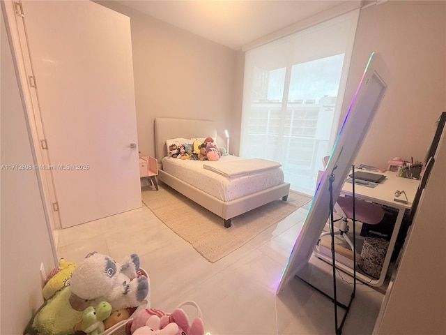 bedroom featuring light tile patterned floors