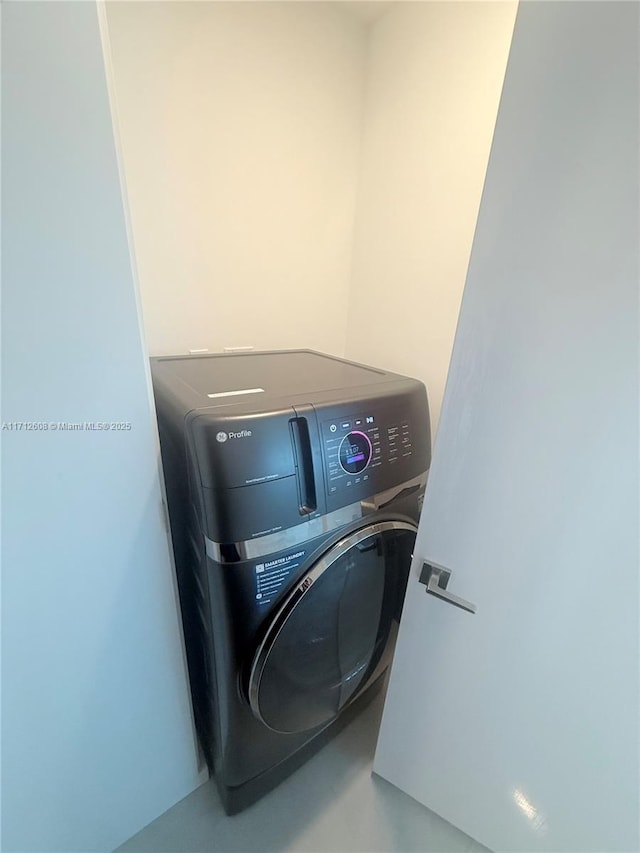 laundry room featuring washer / clothes dryer