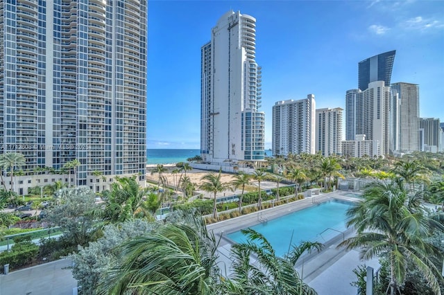 view of pool featuring a water view