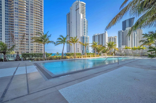 view of pool featuring a patio area