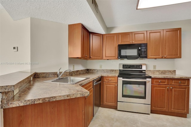 kitchen with sink, stainless steel appliances, kitchen peninsula, a textured ceiling, and light tile patterned flooring