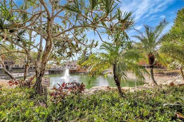 view of side of property with a water view