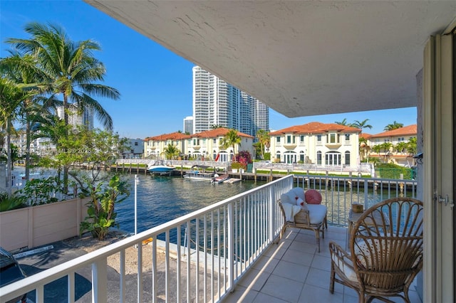 balcony featuring a water view