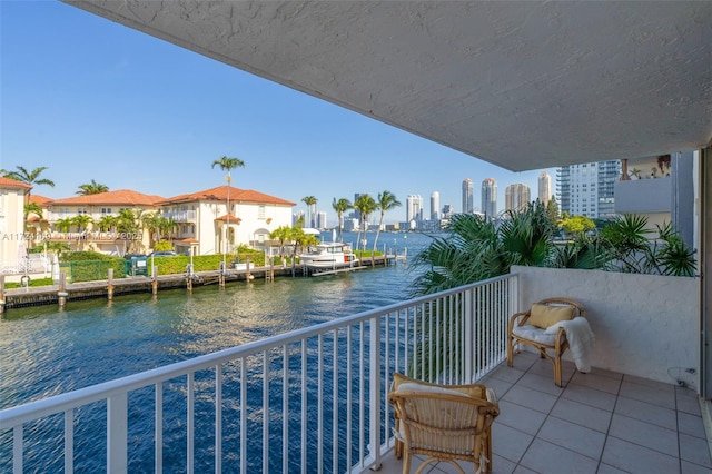 balcony featuring a water view