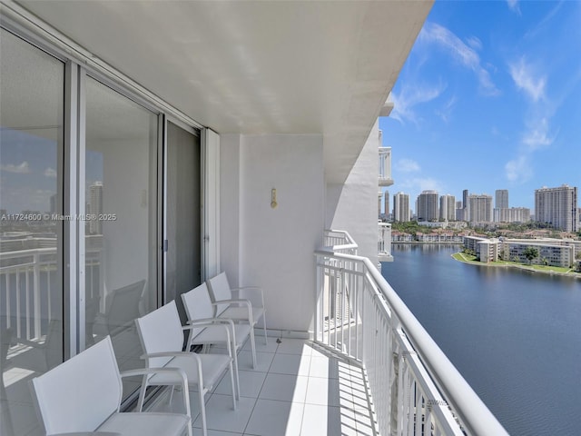 balcony featuring a water view