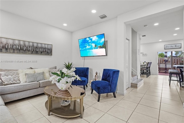 living room with light tile patterned flooring