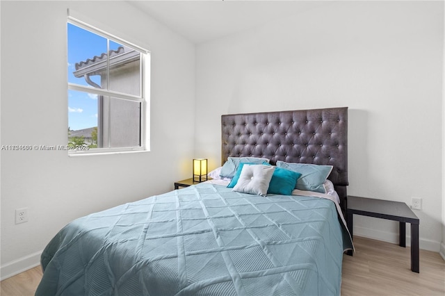 bedroom featuring light hardwood / wood-style flooring