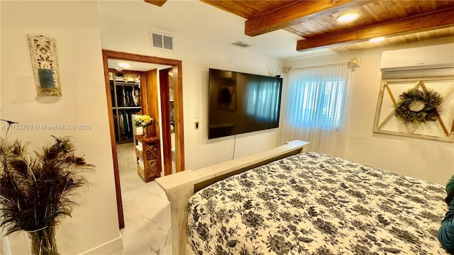 bedroom featuring a wall mounted AC, a closet, wood ceiling, beam ceiling, and a walk in closet