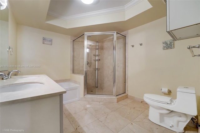 full bathroom featuring shower with separate bathtub, toilet, vanity, a tray ceiling, and crown molding