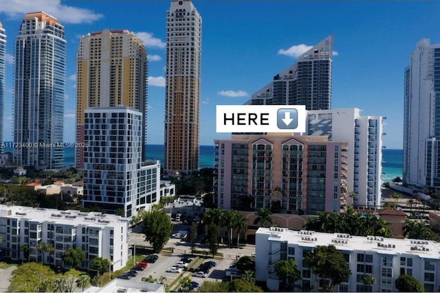 property's view of city with a water view