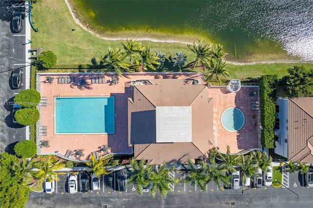 bird's eye view with a water view