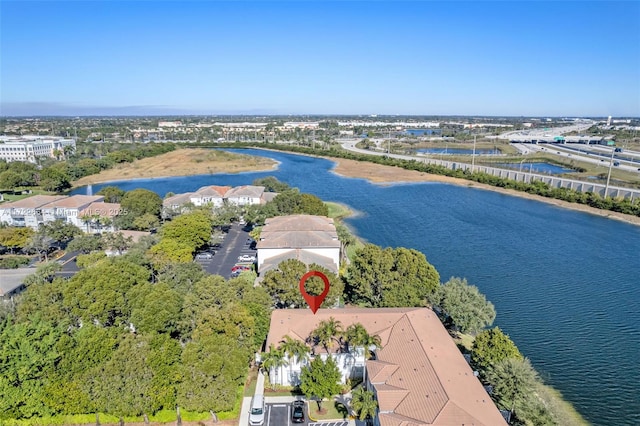 birds eye view of property featuring a water view