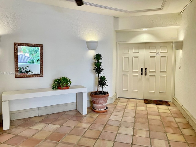 entrance foyer with light tile patterned floors