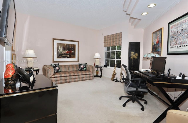 carpeted office space featuring ornamental molding