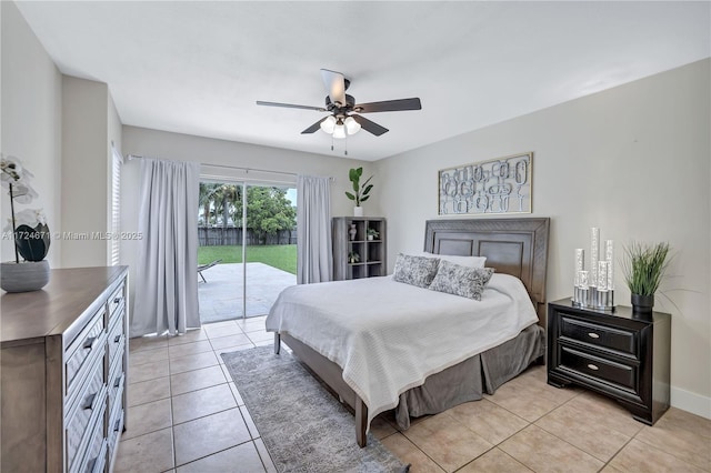 bedroom featuring access to outside, ceiling fan, and light tile patterned flooring