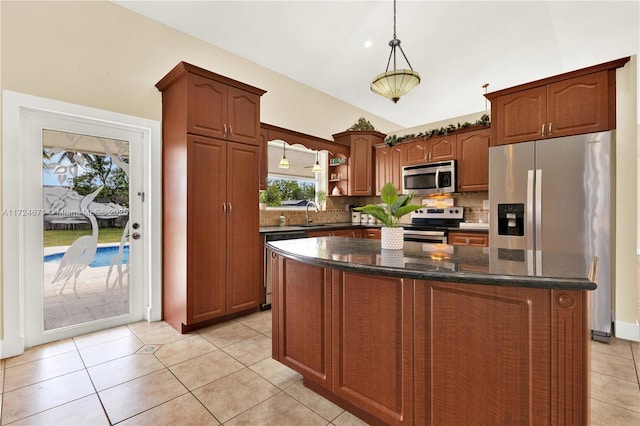 kitchen featuring light tile patterned floors, open shelves, backsplash, stainless steel appliances, and hanging light fixtures