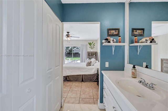 bathroom with vanity, tile patterned flooring, and ceiling fan