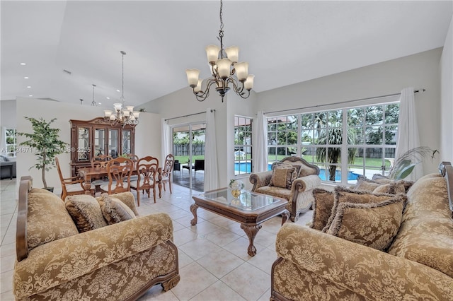 living room with lofted ceiling, light tile patterned floors, and a notable chandelier