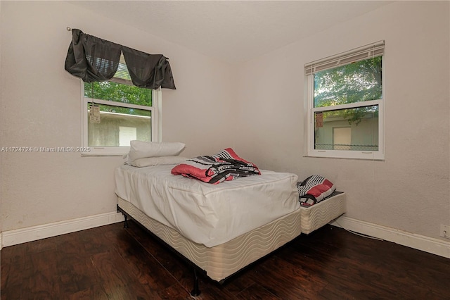 bedroom featuring hardwood / wood-style floors