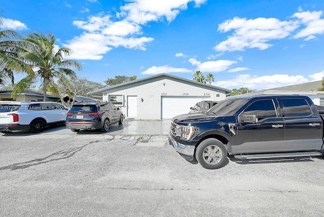 view of property exterior featuring a garage