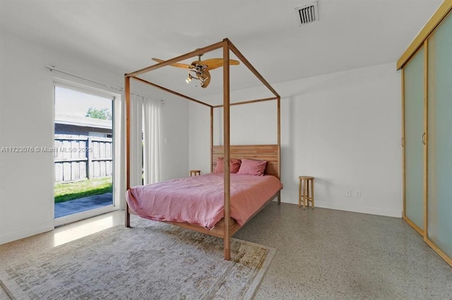 bedroom with ceiling fan and access to exterior