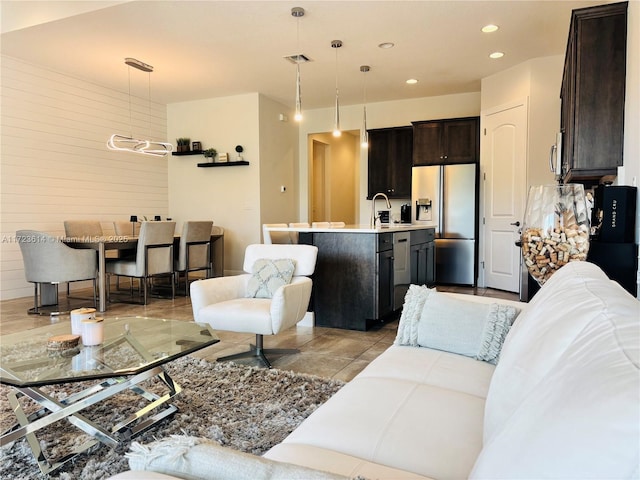 living room featuring sink