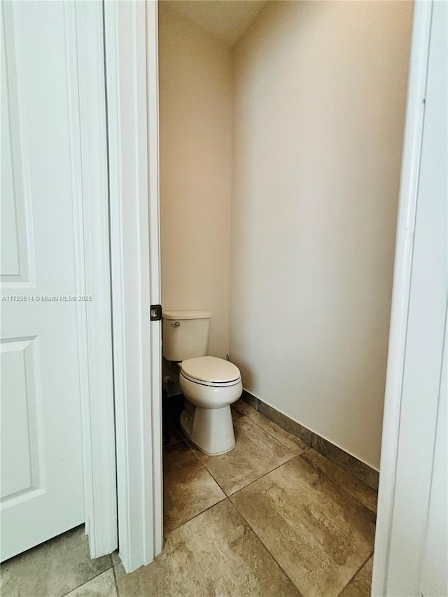 bathroom featuring toilet