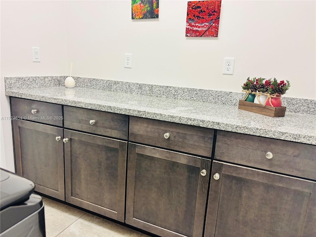 bathroom featuring tile patterned floors and vanity