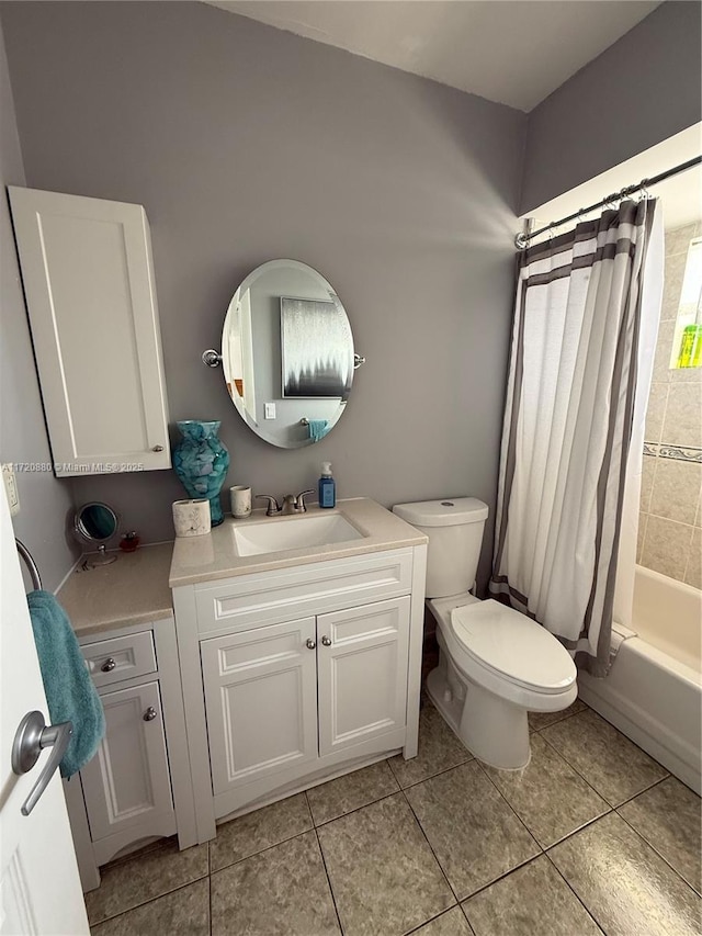 full bathroom with tile patterned floors, vanity, toilet, and shower / bathtub combination with curtain