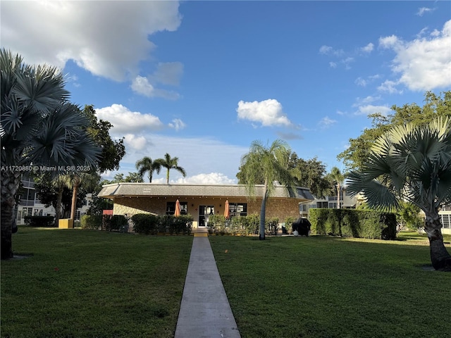 view of front of house with a front yard