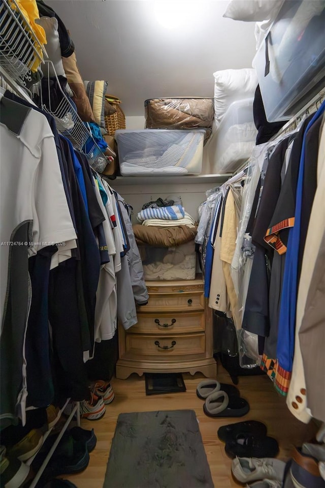 spacious closet featuring wood finished floors