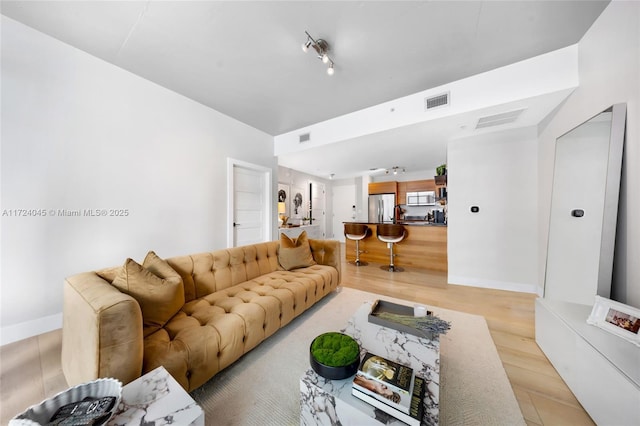 living room with light wood-type flooring