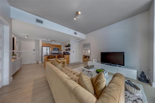 living room featuring light hardwood / wood-style flooring