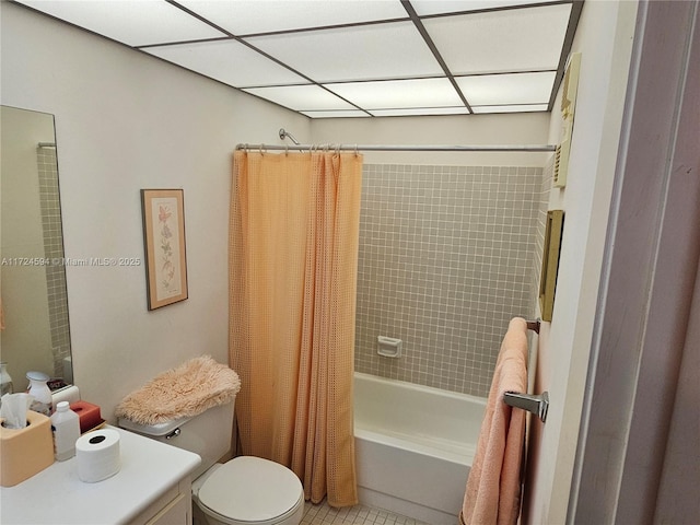 full bathroom featuring toilet, vanity, tile patterned flooring, and shower / bathtub combination with curtain