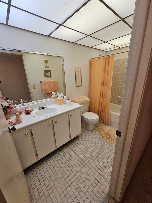 full bathroom with tile patterned flooring, toilet, vanity, and shower / bath combination with curtain