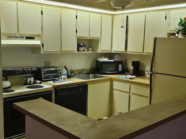 kitchen featuring sink and black appliances