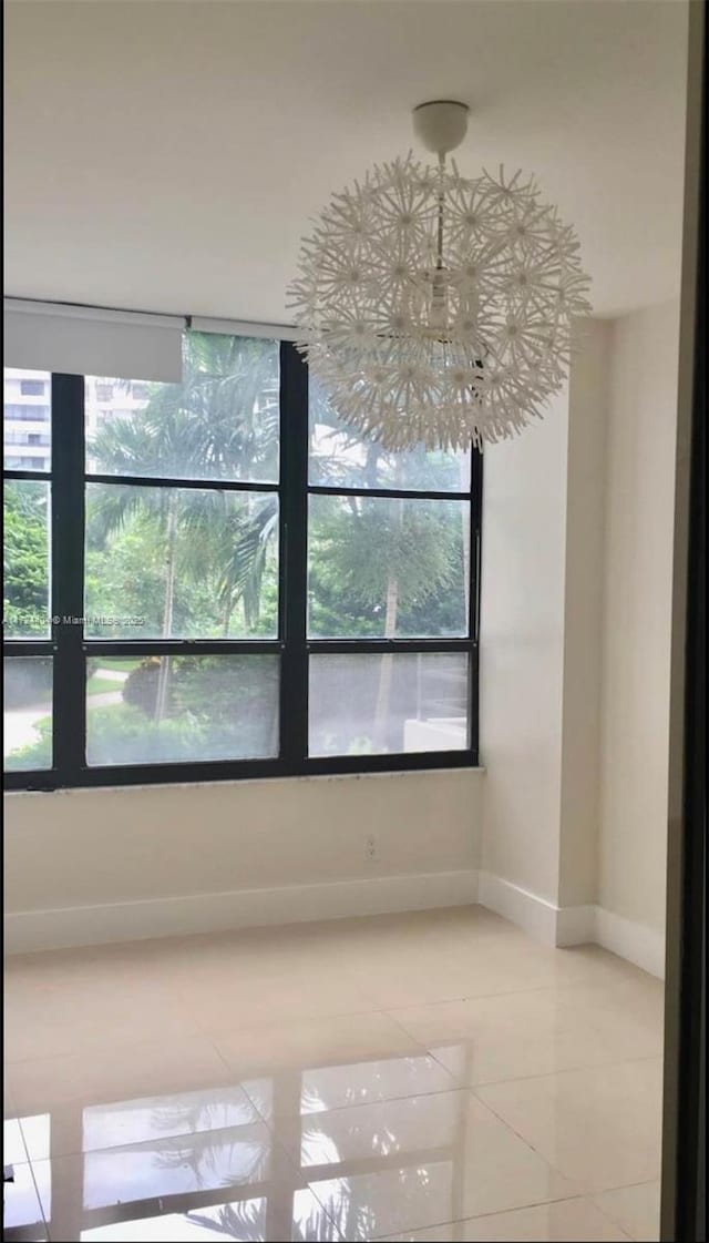 empty room with tile patterned floors