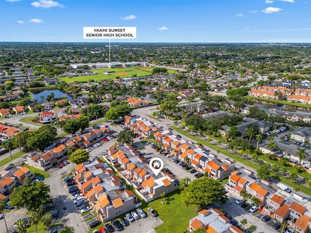 aerial view with a water view and a residential view