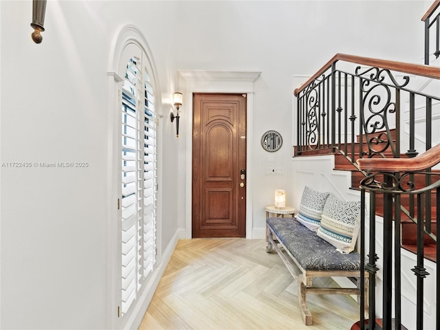 foyer featuring light parquet flooring