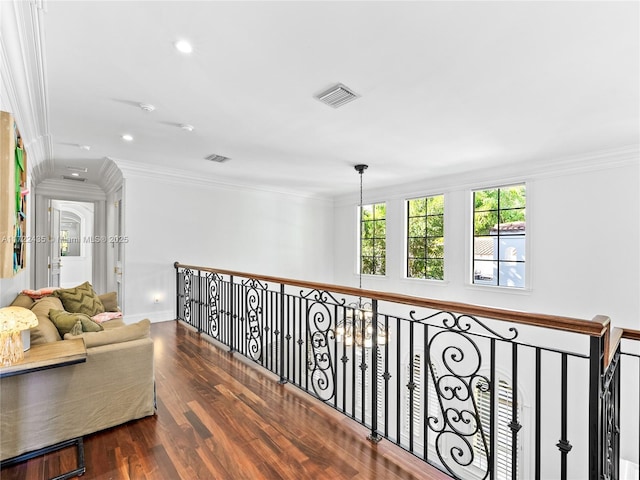 hall featuring dark hardwood / wood-style flooring and ornamental molding