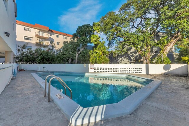 community pool with fence