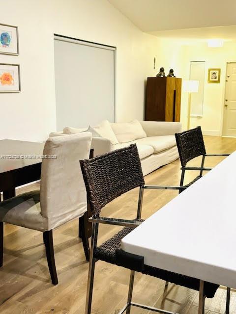4357 Magnolia Ridge Dr, Weston, FL 33331 - living area with lofted ceiling and light wood-style flooring