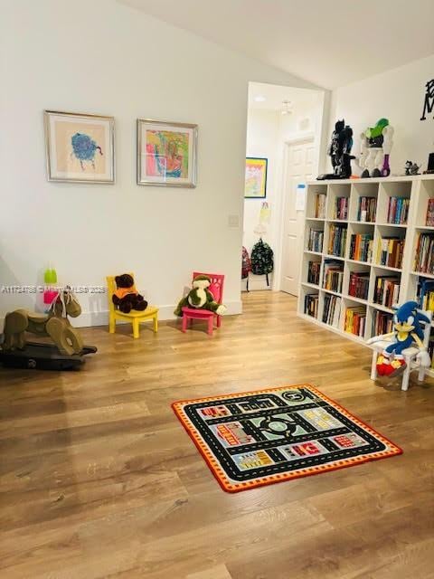 4357 Magnolia Ridge Dr, Weston, FL 33331 - playroom featuring lofted ceiling and wood finished floors