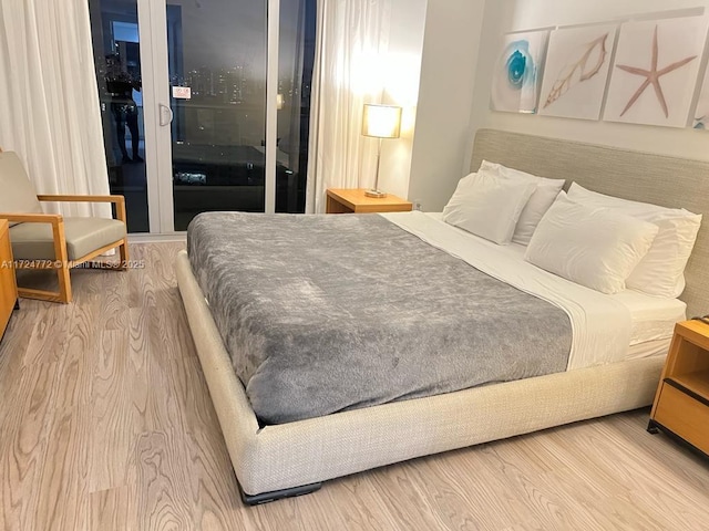 bedroom featuring hardwood / wood-style floors