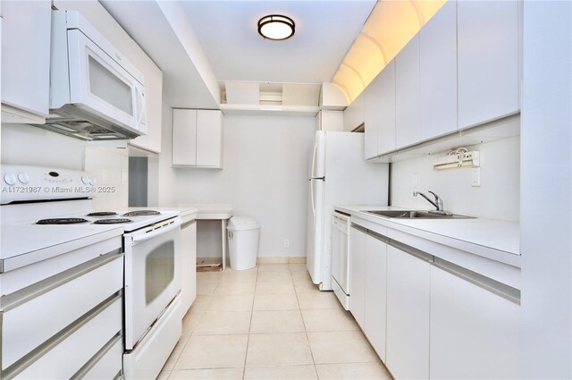 hall with light tile patterned floors