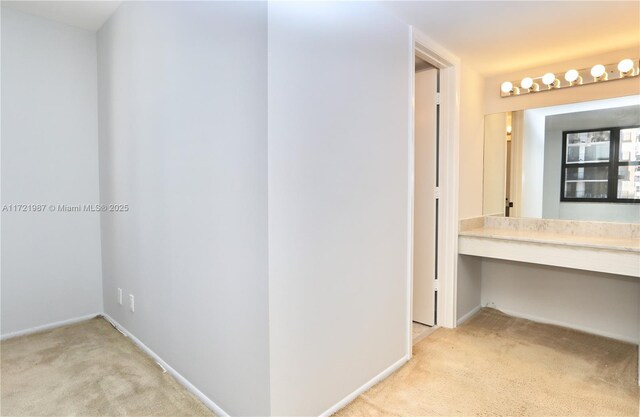 bathroom with toilet and an enclosed shower