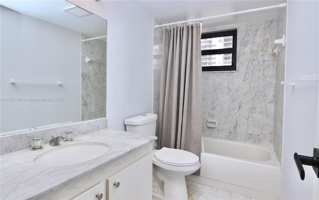 full bathroom featuring shower / bath combo, vanity, and toilet