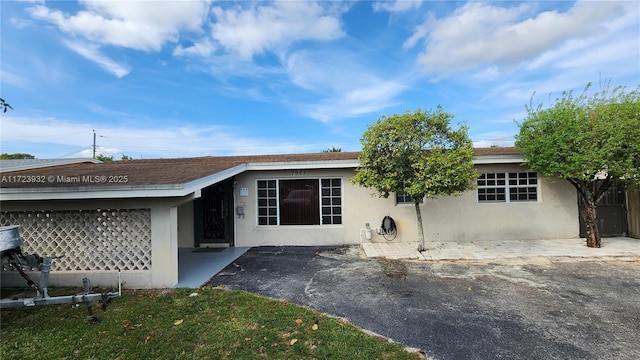 exterior space with stucco siding