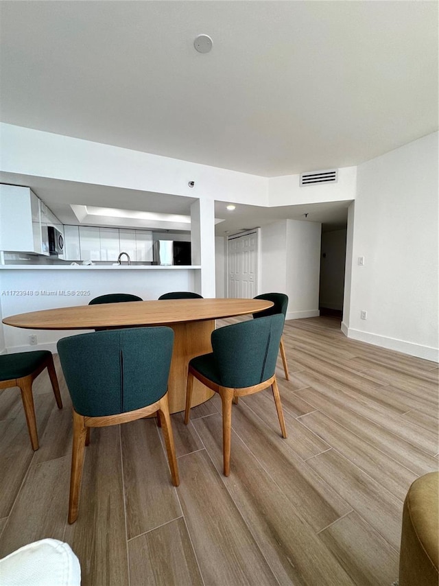 interior space with light hardwood / wood-style flooring