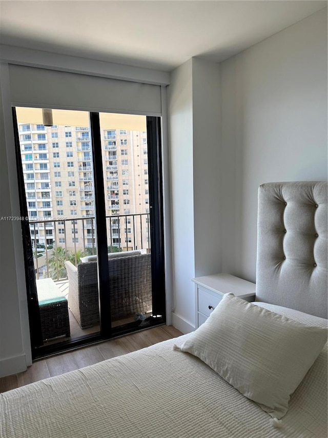 bedroom with wood-type flooring